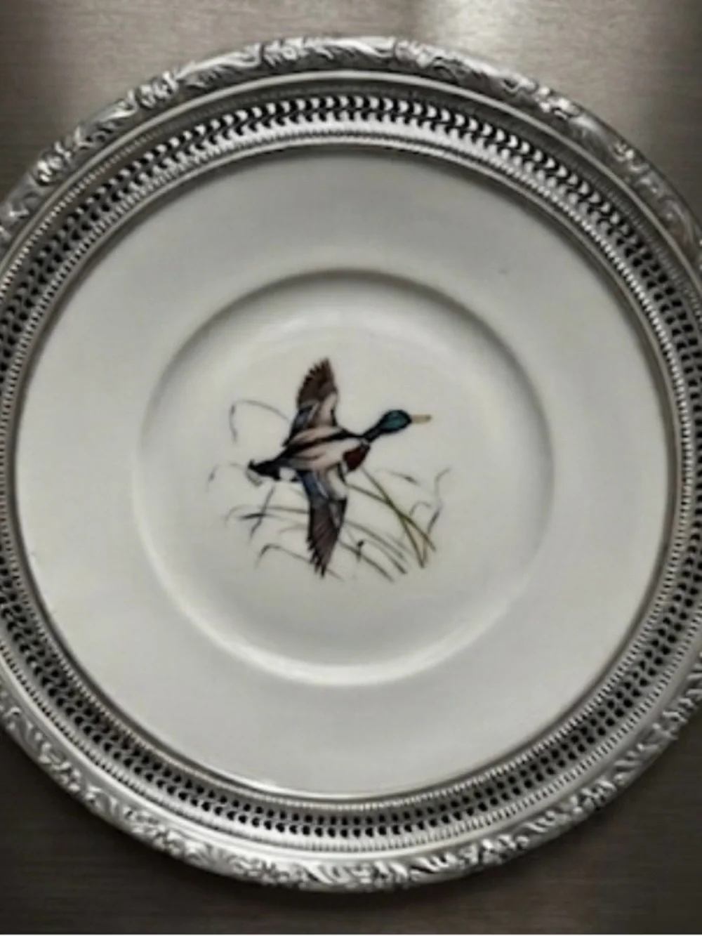 gorgeous !  this vintage Frank M. Whiting porcelain plate sterling silver trim.